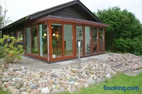 Blockhaus mit Wintergarten in Strandnähe - Image 1
