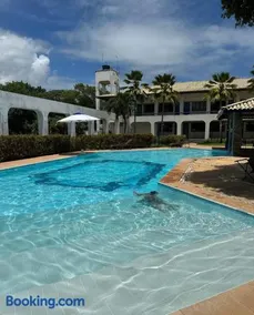 Flat com Piscina Guarajuba 2 Quartos 100m da Praia - Image 1