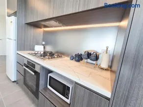 Olympic Park Escape 2BR w Gym, Pool & Free Parking - Image 4