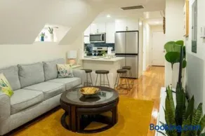 Breezy 3BR Boston Apt - Bathtub, Parking, TV, Walk to Train 803 - Image 1