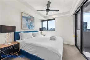 Luxe Newstead Pad with 65-inch TV, Balcony, Pool and Gym - Image 2