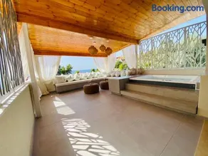 Deluxe Two-Bedroom Suite with Sea View & Jacuzzi - Image 1