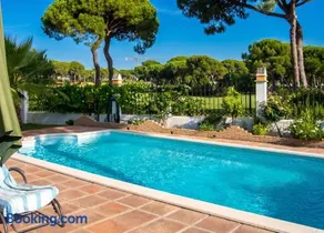 Elegant Villa in Nuevo Portil with Shared Pool - Image 2