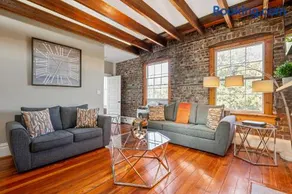 Sprawling Penthouse with Rooftop Deck Blocks from the River - Image 4