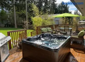 Near Fairgrounds Entire Home Hot Tub Movie Room EV Charger Fire Pit Patio 3 King Beds Sleeps 6 - Image 2