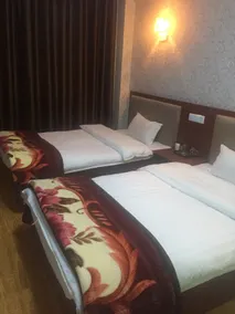 Longde Jindong Business Hotel - Image 4