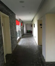 Zhouzhishui Street Aizai Road Cultural Theme Hotel - Image 4