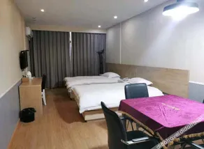 Xinli Business Hotel (Longyou Dananmen Branch) - Image 4