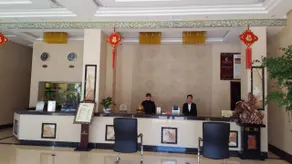 Xingyishun Kailong Business Hotel - Image 5
