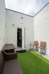 Suarez Art Stay 4BR Oasis with Patio Parking  - Image 5