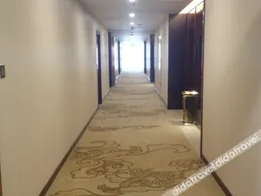 Saina Shengtai Hotel - Image 4