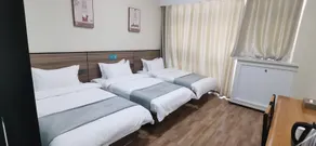 Qufu Xueerxing Hotel (East Railway Station Yuandong College) - Image 5