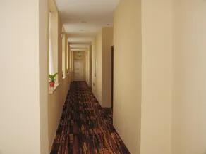 Wanxin Business Hotel - Image 4