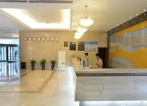 Huaqiao International Hotel - Image 2