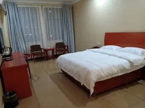 Yizhang Xingfucheng Hotel - Image 4