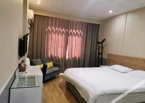 Xinli Business Hotel (Longyou Dananmen Branch) - Image 3