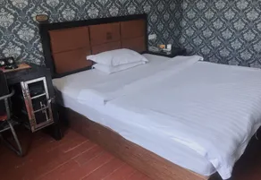 Xinganshunxin Hotel - Image 4