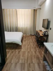 Qufu Xueerxing Hotel (East Railway Station Yuandong College) - Image 3
