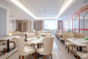 Vienna Hotel Wuzhou Tengxian Central City - Image 4