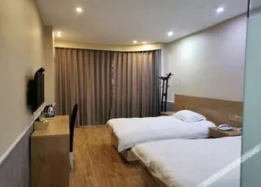 Xinli Business Hotel (Longyou Dananmen Branch) - Image 2