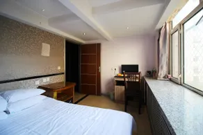 Jixi Aishangjia Express Hotel - Image 4