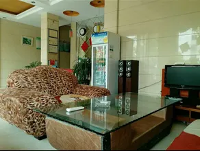 Xinganshunxin Hotel - Image 1