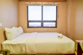 Nice and Cozy 2BR Apartment at Atria Residence Gading Serpong By Travelio - Room