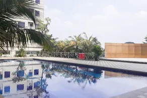 Comfortable and Homey Studio at Titanium Square Apartment By Travelio - Pool