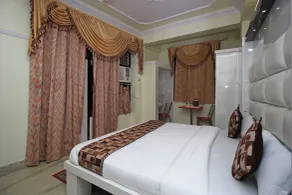 Ganpati Plaza Hotel - Chambre