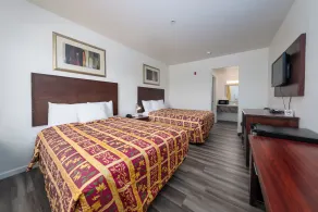 America Inn & Suites - Chambre