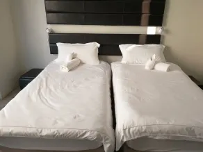 Tsumeb Guesthouse Kamho - Quarto