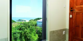 CHULAX OKINAWA YOMITAN【Designer Condominium Hotel】 - Vue de la chambre