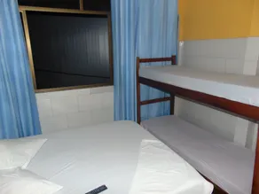 Kitnets com AR Condicionado na Praia - Chambre