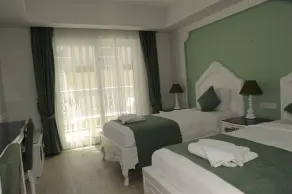 Montebello Deluxe Hotel - Værelse