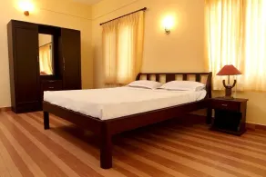 The Crescent Wayanad Heritage Pool Resort - Chambre