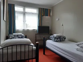 Ariki Backpackers - Chambre