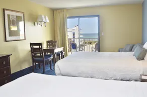 Coastal Palms Inn and Suites - Room