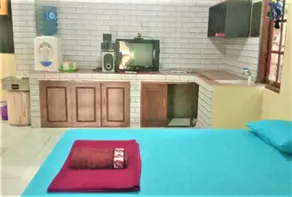 Penginapan Rudi Syariah - Habitación
