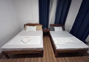 Hill Myna Beach Cottages - Chambre