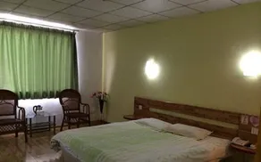 Luoya Fengqing Hotel - Værelse