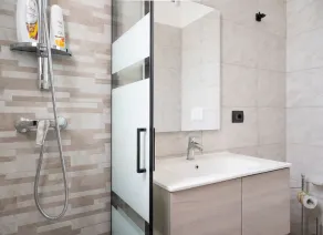 Monolocale Vela Nuovo con Wi-Fi, Clima e Giardino a Torre Lapillo - Bagno