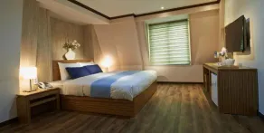 Hotel Four Seasons - Chambre