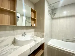 Good Deal and Elegant Studio Vasanta Innopark Apartment By Travelio - Bathroom