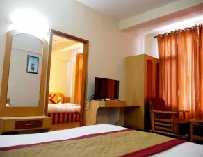 New Ambika International - Room