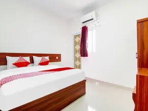 OYO 91301 Lewis Dc Guesthouse - Habitación
