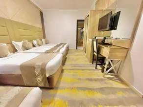 Al Mukhtara International Hotel - Chambre