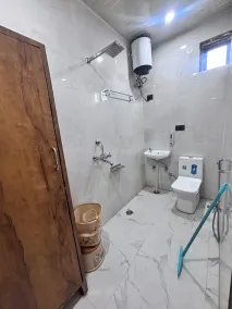 SK Govindam Royal Stay - Bathroom