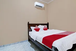 Hotel O Sandira Syariah - Habitación