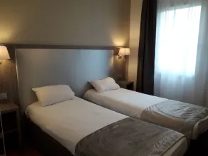 Séjours & Affaires Clairmarais - Reims - Chambre
