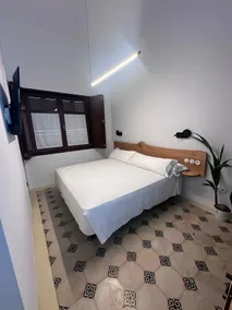 La Moderna Suites - Zimmer